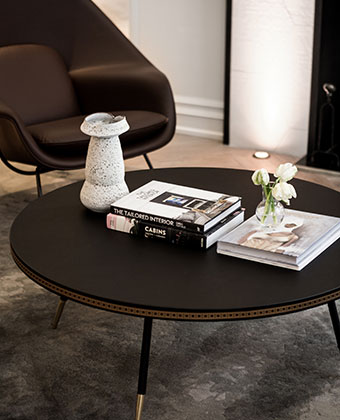 Living room table, books, chair
